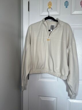 Reebok Cream Half-Zip Cropped Fleece Pullover with Small Logo
